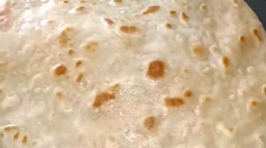 Rajma paratha wrap stuffed with rajma tikki, vegetables, and cheese 4